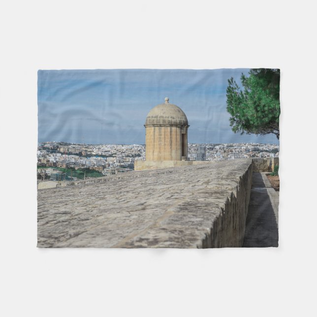 Gun turret on old city walls in Valletta, Malta Fleece Blanket (Front (Horizontal))
