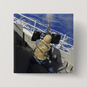Gunners Mate firing a 50 calibre machine gun 15 Cm Square Badge