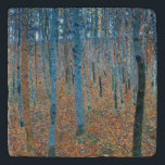 Gustav Klimt Beech Tree Forest Grove Trivet<br><div class="desc">This is based on classic nature painting artworks by Gustav Klimt, Beech Grove 1, 1902. The artwork portrays a dense forest of tall, slender birch trees, with pale trunks marked by dark, vertical lines. The foliage is depicted in shades of blue, green, and yellow, adding a sense of depth and...</div>