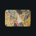Gustav Klimt Lady With Fan Art Nouveau Painting Bath Mat<br><div class="desc">Gustav Klimt Lady With Fan Art Nouveau Painting This half portrait of a beautiful woman shows a yellow background with asiatic ornaments, colourful birds and lotus flowers. The lady wears a dress in the style of a kimono imprinted with motives of a Chinese dragon dress. Beautiful artistic romantic decorative fine...</div>