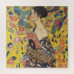 Gustav Klimt Lady With Fan Art Nouveau Painting Jigsaw Puzzle<br><div class="desc">Gustav Klimt Lady With Fan Art Nouveau Painting This half portrait of a beautiful woman shows a yellow background with asiatic ornaments, colourful birds and lotus flowers. The lady wears a dress in the style of a kimono imprinted with motives of a Chinese dragon dress. Beautiful artistic romantic decorative fine...</div>