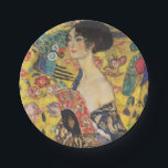 Gustav Klimt Lady With Fan Art Nouveau Painting Paper Plate<br><div class="desc">Gustav Klimt Lady With Fan Art Nouveau Painting This half portrait of a beautiful woman shows a yellow background with asiatic ornaments, colourful birds and lotus flowers. The lady wears a dress in the style of a kimono imprinted with motives of a Chinese dragon dress. Beautiful artistic romantic decorative fine...</div>