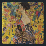 Gustav Klimt Lady With Fan Art Nouveau Painting Trivet<br><div class="desc">Gustav Klimt Lady With Fan Art Nouveau Painting This half portrait of a beautiful woman shows a yellow background with asiatic ornaments, colourful birds and lotus flowers. The lady wears a dress in the style of a kimono imprinted with motives of a Chinese dragon dress. Beautiful artistic romantic decorative fine...</div>