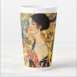 Gustav Klimt Lady with Fan Latte Mug<br><div class="desc">Latte Mug featuring Gustav Klimt’s oil painting Lady with Fan (1918). A woman wearing a blue kimono holds a red fan against a colourful yellow background of flowers and peacocks. A great gift for fans of Japonisme and European art.</div>