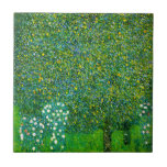 Gustav Klimt Roses Under The Pear Tree Tile<br><div class="desc">Gustav Klimt Roses Under The Pear Tree tile. Oil on canvas from 1905. A beautiful painting from Austrian artist Gustav Klimt. One of Klimt’s gorgeous landscapes which blended impressionist and art nouveau tendencies, this work combines Klimt’s love of flowers and fruit trees with vibrant greens and yellows. A great art...</div>