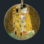 Gustav Klimt The Kiss Vintage Art Nouveau Painting Ceramic Tree Decoration<br><div class="desc">Gustav Klimt The Kiss Vintage Art Nouveau Painting The Kiss (In German: Der Kuss) was painted by the Austrian Symbolist painter Gustav Klimt between 1907 and 1908, the highpoint of his Golden Period, when he painted a number of works in a similar gilded style. The painting is widely considered a...</div>