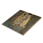 Gustav Klimt's The Kiss (circa 1908) Tile<br><div class="desc">A classic artwork that has passed into the public domain and makes wonderful gifts and other products. One of Gustav Klimt's most famous works, The Kiss features prominent use of gold leaf, and was inspired by the ornate style of ancient mosaics. Klimt (1862-1918) was one of the primary members of...</div>