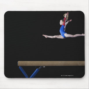 Gymnast (9-10) leaping on balance beam 2 mouse pad