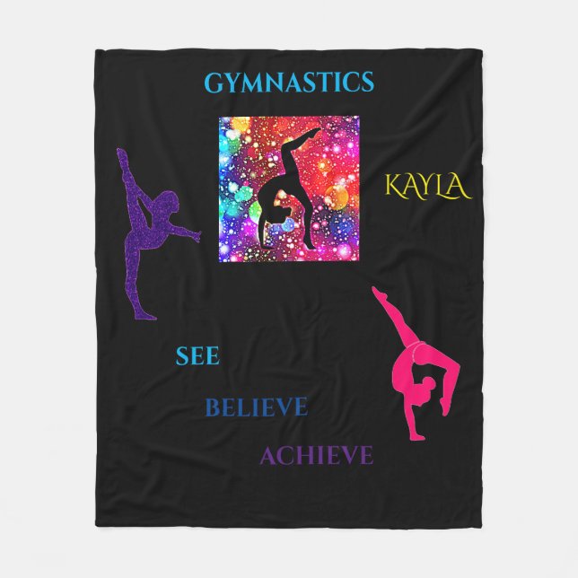 Gymnastics designs on a black fleece blanket. (Front)