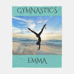 Gymnastics fleece blanket with personalized name.