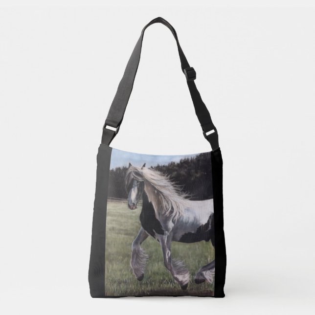 Gypsy vanner pinto horse running in field crossbody bag (Front)