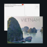 Ha Long Bay, Vietnam Travel Postcard<br><div class="desc">Send this beautiful postcard to your loved ones featuring traditional wooden tour boats dock along the base of a towering limestone karst in the emerald waters of Ha Long Bay, </div>