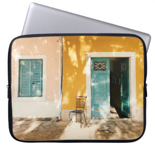 Half open green wooden main door laptop sleeve
