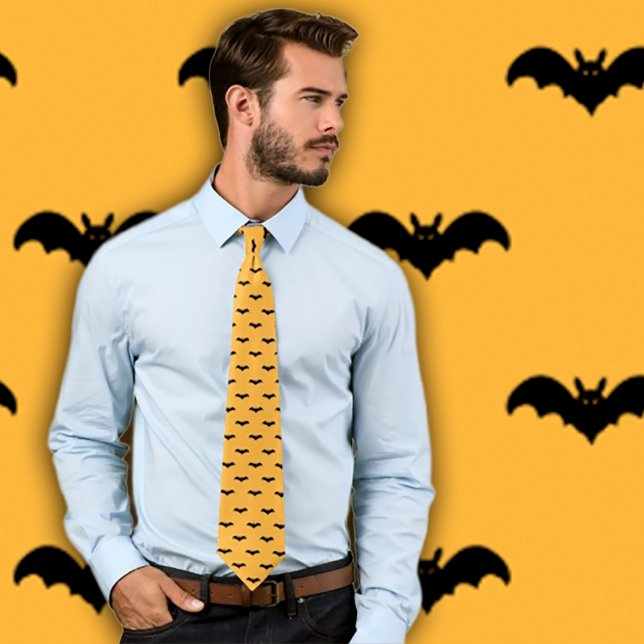 Halloween Bats- Black and Orange Tie (Man wears an orange necktie with a pattern of black bats.  Background matches necktie pattern. )