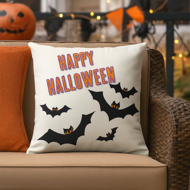 Halloween Bats Porch / Patio  Cushion (The outdoor pillow features a bold “Happy Halloween” design with jagged-winged bats )
