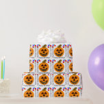 Halloween Birthday Orange Pumpkin Wrapping Paper<br><div class="desc">Fun Halloween Birthday. Smiling orange jack-o-lantern pumpkin with red eyes and big brown stalk and yellow smile. Colourful flying balloons adorn wrapping paper in red, blue, orange, green, yellow. Happy Birthday is written in black text bottom of pumpkin, and Happy Halloween Birthday written in a fun font on sides of...</div>