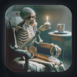 Halloween Birthday Skeleton  Paper Plate<br><div class="desc">A skeleton sits in a worn armchair holding a cupcake with a lit birthday candle for a Halloween birthday Party.
Text can be changed or deleted</div>