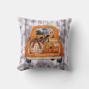 Halloween harvest orange pickup truck with pumpkin cushion