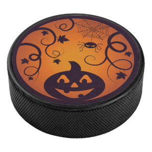Halloween Jack o lantern pumpkin face and spider Hockey Puck