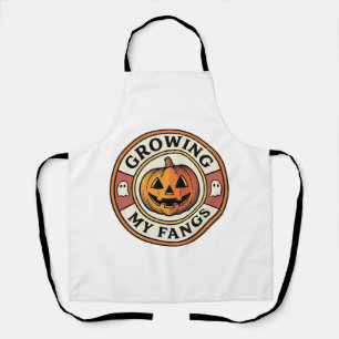 Halloween Pumpkin Growing My Fangs Vintage Badge_1 Apron