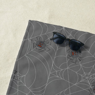 Halloween spiders web and pumpkins beach towel