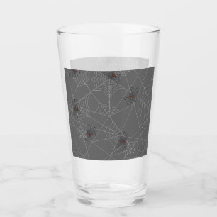 Halloween spiders web and pumpkins glass