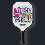 Halloween Witchy And Wild Witch Broom Name Pickleball Paddle<br><div class="desc">Halloween Witchy And Wild Witch Broom Typography Personalised NameT-Shirt features the text "Witchy and wild" in fun modern typography. Personalise with your name by editing the text in the text box provided. Perfect gifts for birthday or Halloween parties. Designed by © Evco Holidays at www.zazzle.com/store/evcoholidays</div>