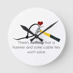Hammer and zap-strap round clock
