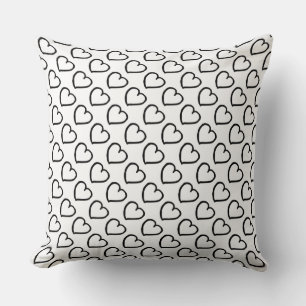 Hand drawn hearts pattern black on white cushion