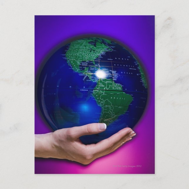 Hand holding earth postcard (Front)