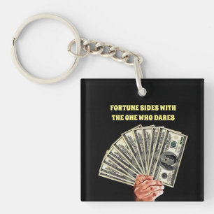 hand holding hundred dollar bills money finance key ring