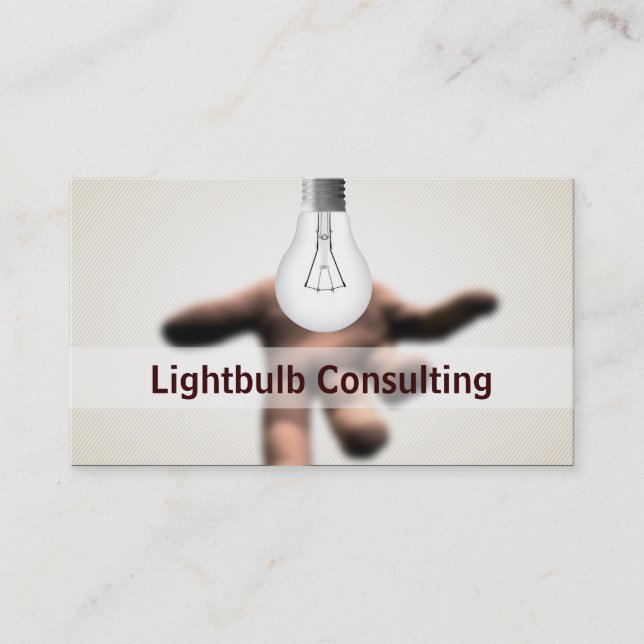 Hand Holding Light Bulb Consulting business card (Front)