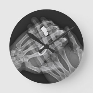 Hand Holding Round Clock