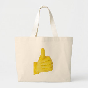 Hand in yellow latex glove large tote bag