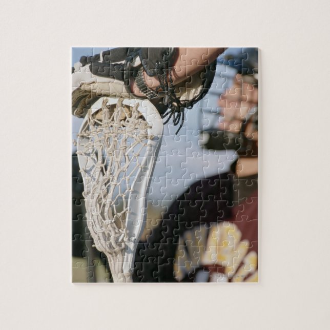 Hand on a Lacrosse Stick Jigsaw Puzzle (Vertical)