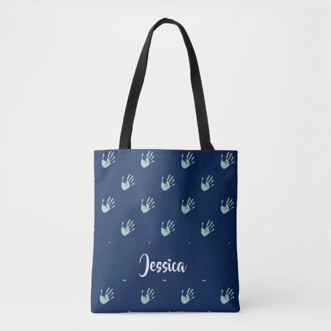 Hand prints on blue tote bag (Front)