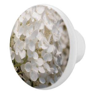 Handle of white door, flowers ceramic knob