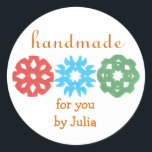 "Handmade" holiday gift label<br><div class="desc">Cute,  classy gift label for the holidays,  featuring kids' snowflake cutouts.  Perfect for any homemade gift,  from a tin of cookies to a hand-knit scarf.  Personalise in a flash by replacing our sample name with yours.  Creators give half their proceeds to children's charities.</div>