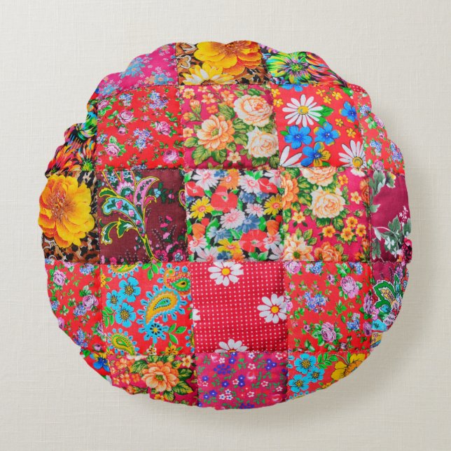 Handmade patchwork quilt with floral pattern as ba round cushion (Front)