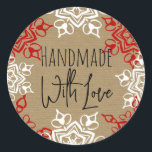Handmade with Love Snowflake Christmas Craft Classic Round Sticker<br><div class="desc">Brown craft paper background print pattern with red and white snowflake shapes around the border of this fun crafty card. Modern and unique Personalised gift tag label sticker. Add your custom text. The look of brown paper bag sack type recycled-looking textured print is modern and fun!</div>
