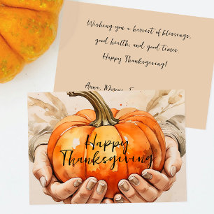 Hands Gently Holding a Pumpkin Thanksgiving Holiday Card