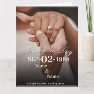 Hands of a Coloured Wedding Couple with Ring Card