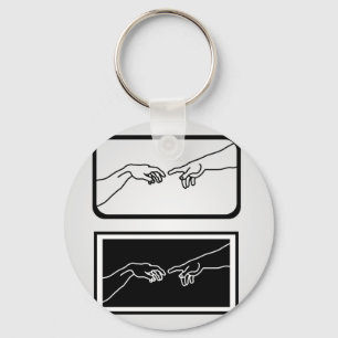 Hands showing the creation of Adam Key Ring