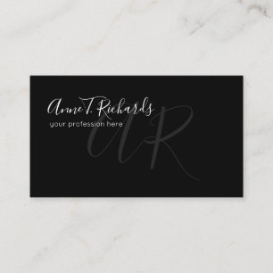 handwritten monogram on black business card
