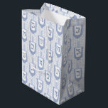 Hanukkah Blue and White Dreidel Pattern on Gingham Medium Gift Bag<br><div class="desc">Hanukkah dreidels on gingham background in light blue and white. Dreidel pieces show Hebrew alphabet.</div>