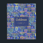Hanukkah Blue Gold Menorah Star of David Name Fleece Blanket<br><div class="desc">This custom Hanukkah fleece blanket features a chic pattern of gold,  green and purple menorah and gold Star of David on a blue background with your family name in faux gold to personalize. Decorate your home in style! Designed by world renowned artist ©Tim Coffey.</div>