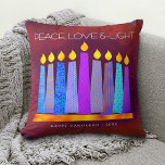 Hanukkah Bold Blue Candles on Red Peace Love Light Cushion<br><div class="desc">“Peace, love & light.” A playful, modern, artsy illustration of boho pattern candles in a menorah helps you usher in the holiday of Hanukkah. Assorted blue candles with colourful faux foil patterns overlay a rich, deep burnt red orange textured background. Faux copper pattern foil on a brick red background for...</div>