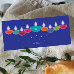 Hanukkah Card | Colourful Oil Lamp Menorah | Blue<br><div class="desc">Celebrate Hanukkah with a vibrant and contemporary greeting card design. This menorah is formed from colourful bowl-shaped oil lamps, each with a glowing flame, arranged in a cheerful display. The centre lamp highlights a faux-foil Star of David, adding both meaning and elegance. Perfect for families who enjoy modern and artistic...</div>