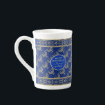 Hanukkah Festival Party Gold Menorah blue pattern Bone China Mug<br><div class="desc">First Candle of Hanukkah. Happy Hanukkah Festival of lights party decoration beauty Jewish holiday gold ornaments design. Vintage Jewish Holiday Chanukkah Navy blue background with traditional Chanukah decorative symbols decor - Gold hanukkiah - menorah, candles, star of David and glowing lights wallpaper gold hanukkiah, wooden dreidels (spinning top toy) with...</div>