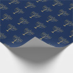 Hanukkah Gold Menorah on Blue Pattern Wrapping Paper<br><div class="desc">Wrap your gifts in style this holiday season with our elegant Hanukkah gift wrap. This simple but chic design features a navy blue background with faux gold menorahs repeated into a pattern. Designed by artists © Tim Coffey and Susan Coffey.</div>